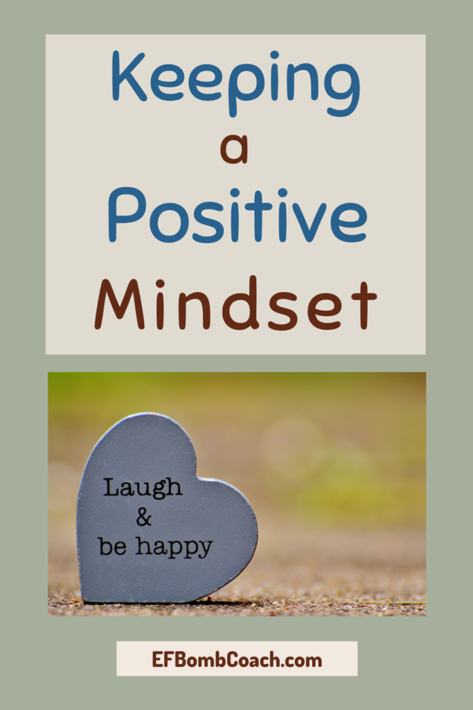 Keeping a positive mindset - heart that says Laugh and be happy