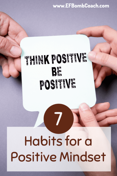 7 Habits for a positive mindset - hands holding a card that says Think Positive Be Positive