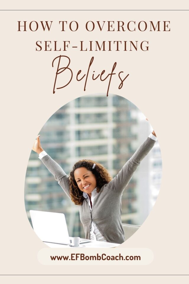 How to overcome self-limiting beliefs - African American woman raising her arms in triumph