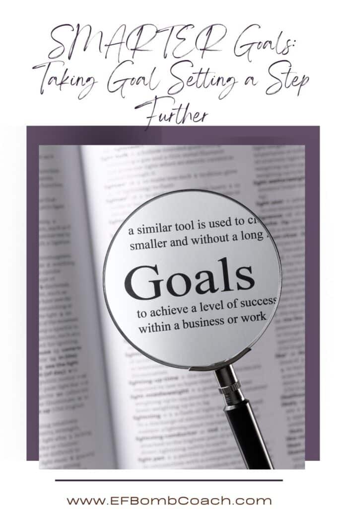 SMARTER Goals: Taking Goal Setting a Step Further  - a magnifying glass over the word Goals in a dictionary