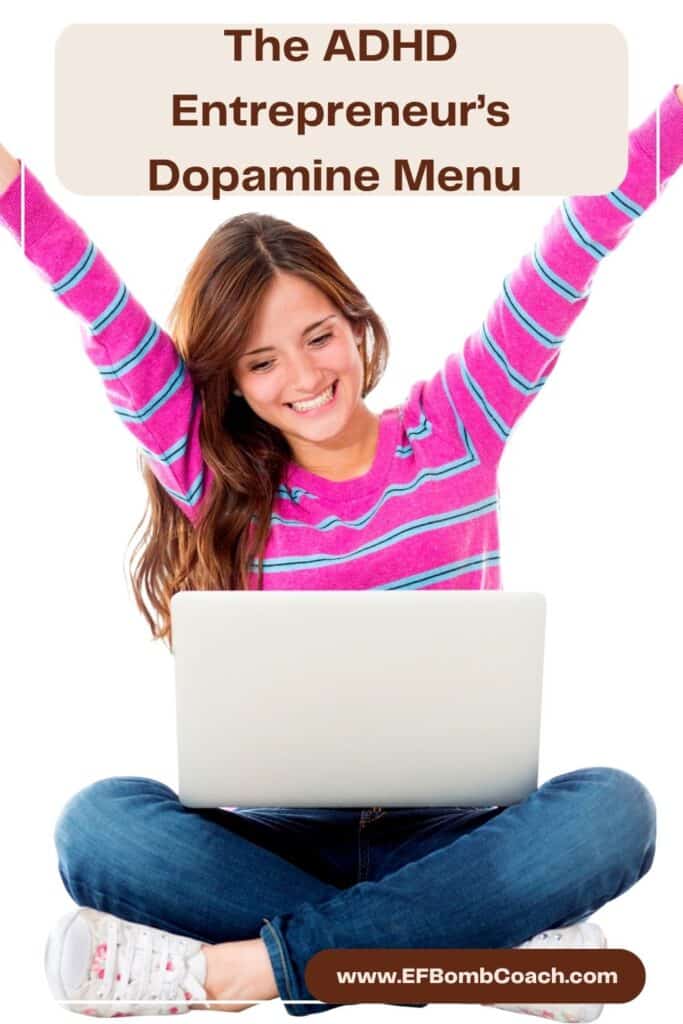 The ADHD Entrepreneur’s Dopamine Menu  - woman with raised arms, happy in front of her laptop